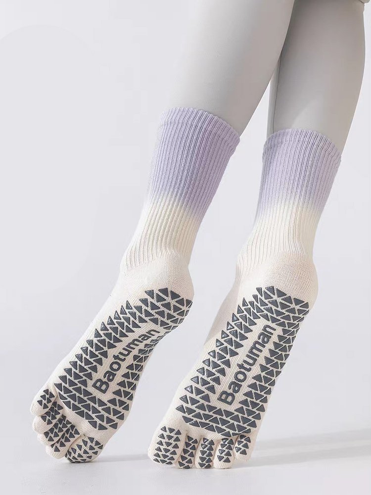 Sole view of Gradient Five-Toe Pilates Socks with Baotuman branding.