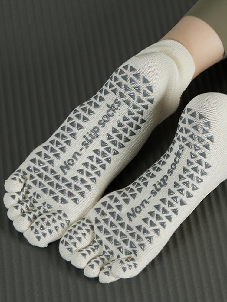 Top-down view of two non-slip sock soles showing 'Non-slip socks' branding.