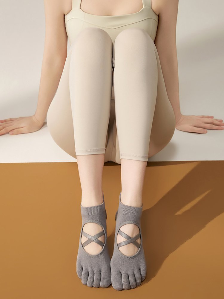 Front view of Cross Strap Pilates Socks showing the five-toe design.
