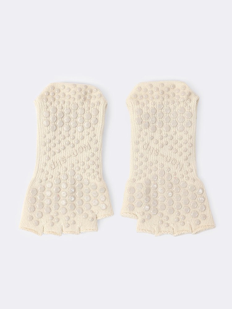 Detailed sole view of Toeless Pilates Socks with branding.